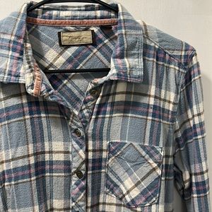 Legacy Falls for her plaid flannel shirt